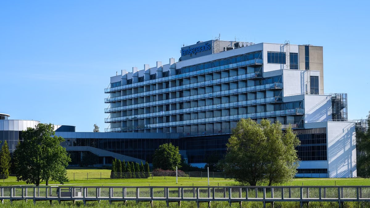 Explore the contemporary Tervise Paradiis spa hotel in Pärnu, Estonia, surrounded by lush greenery.